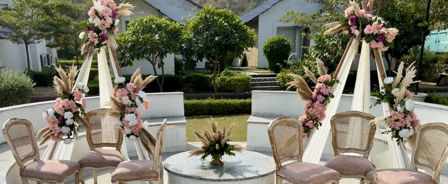 Boho-Mehendi-Sitting-Lounge-Setup-with-Floral-Pampas-Decor-and-Outdoor-Seating-04092026