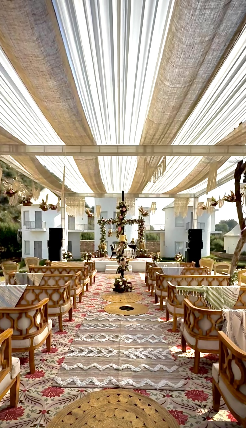 Boho-Mehendi-Stage-Decor-with-Floral-Backdrop-Pampas-Grass-and-Macrame-Styling-04092026