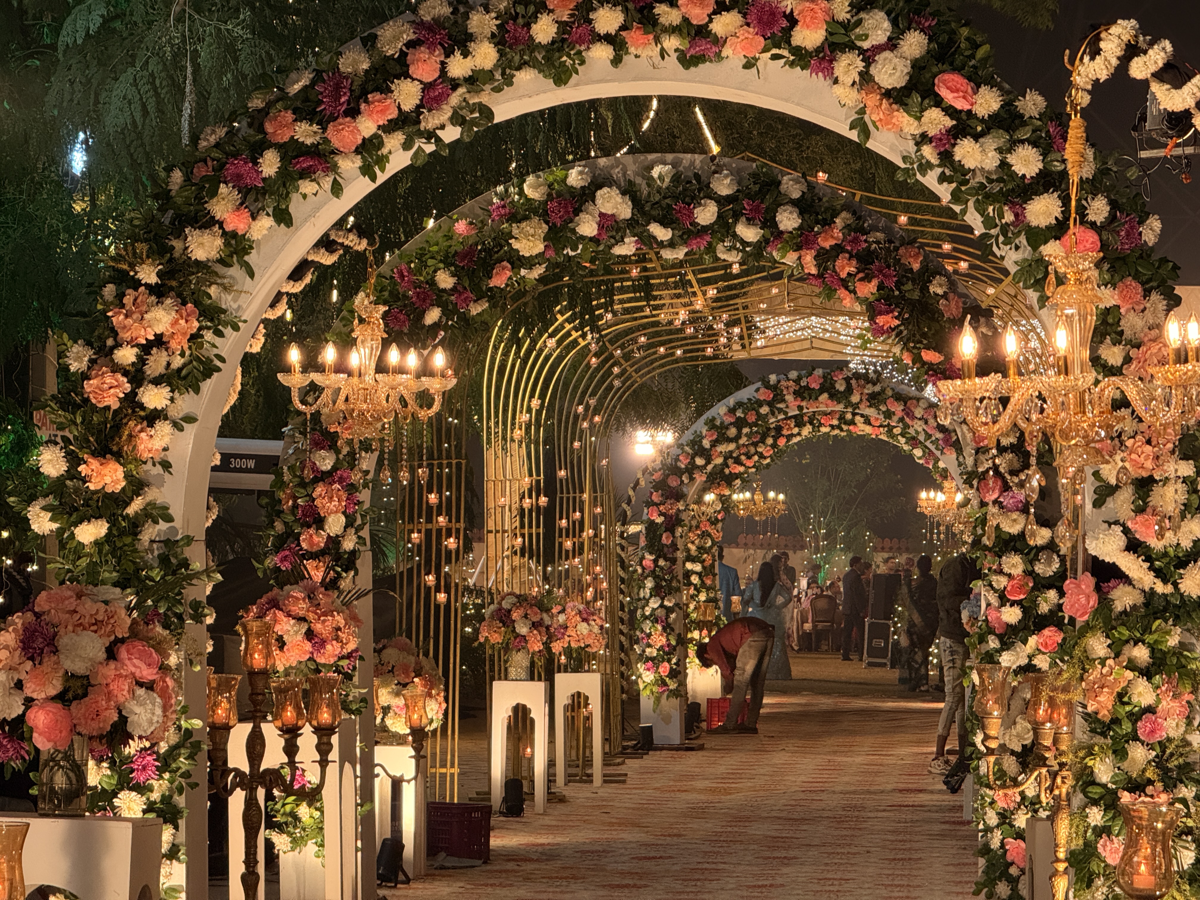 Grand-Wedding-Walkway-With-Multiple-Floral-Arches-And-Lights-Wedifys-03272026