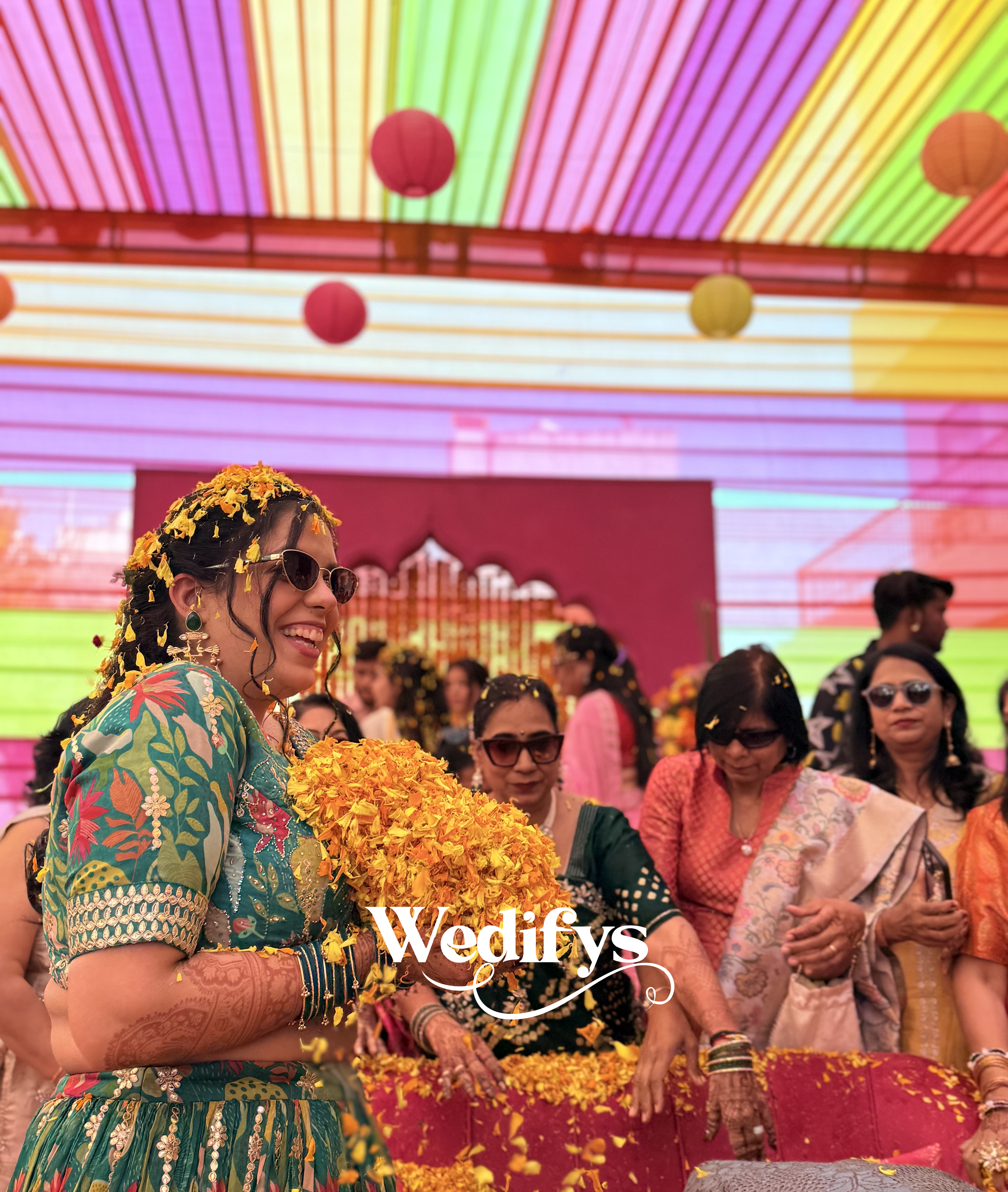 Haldi-Ceremony-Candid-Bride-Joyful-Moment-with-Floral-Vibes-04272026