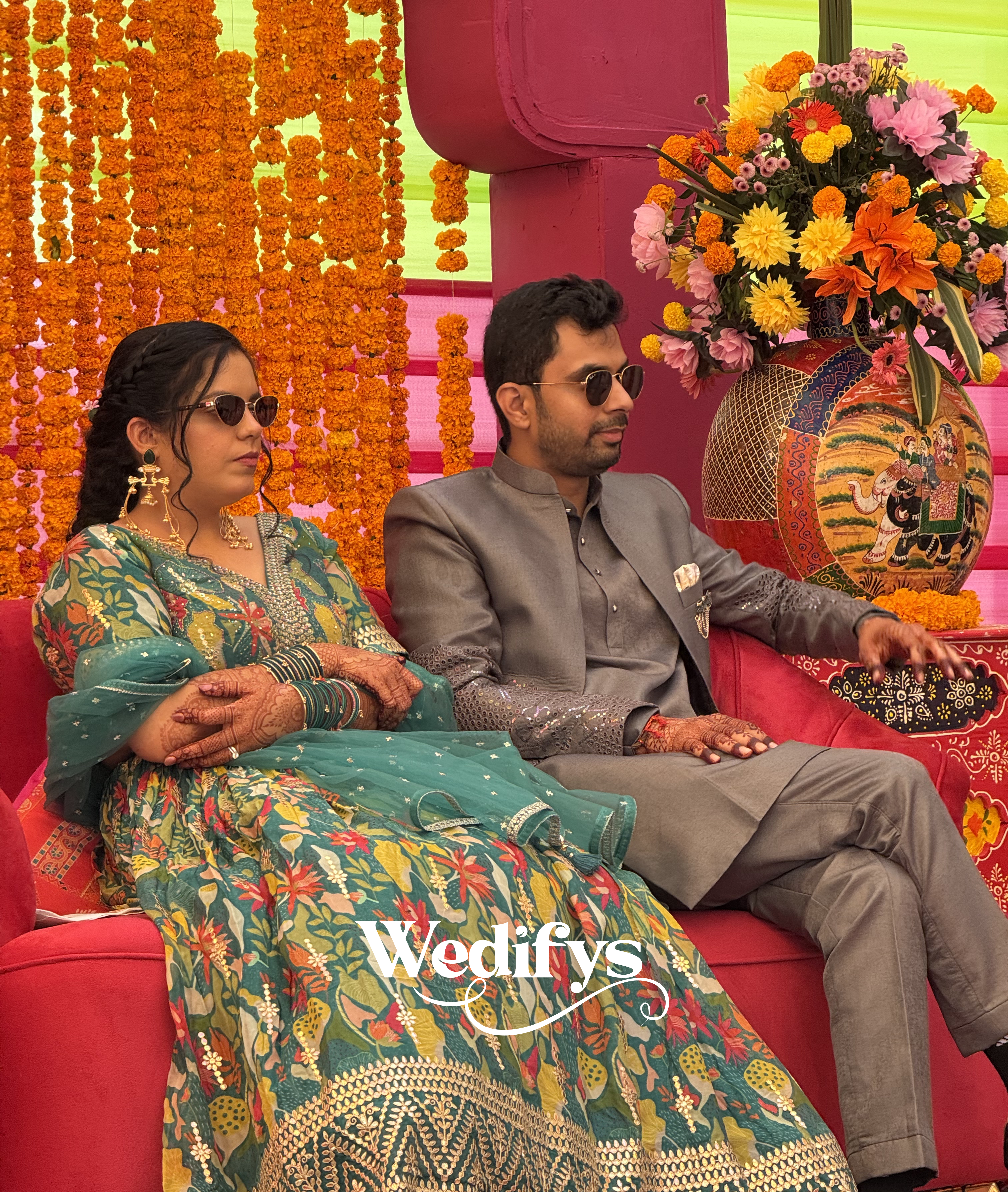 Haldi-Couple-Seating-Pose-Stylish-Wedding-Outfit-Inspiration-04272026