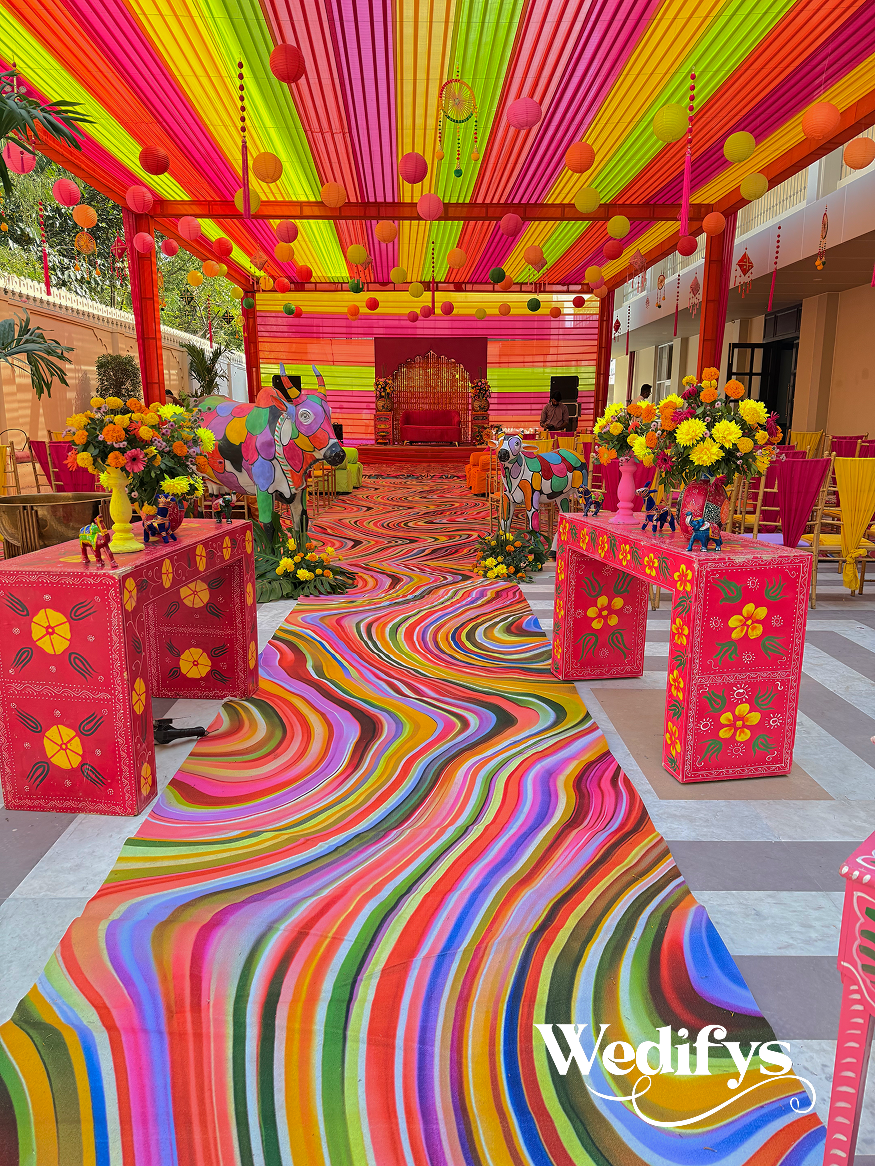 Haldi-Entrance-Walkway-with-Colorful-Carpet-and-Canopy-Decor-04242026