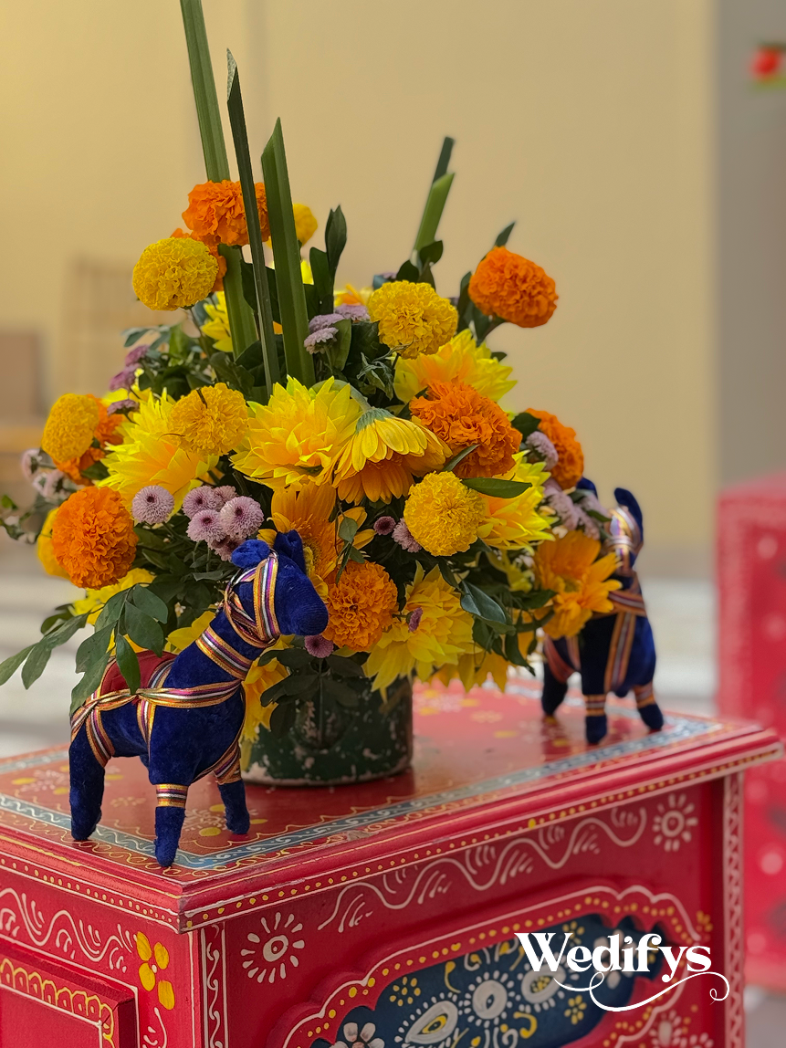 Haldi-Floral-Centerpiece-Decor-with-Arrangement-and-Decorative-Props-04242026