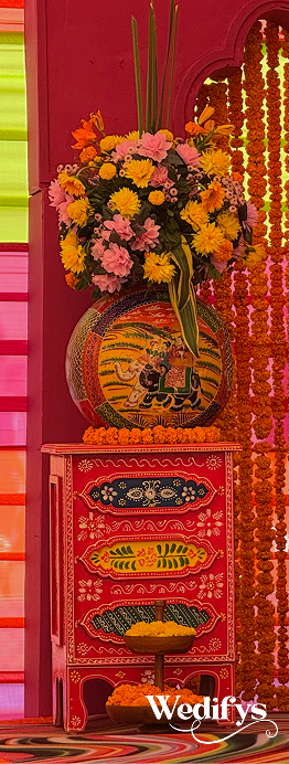 Haldi-Floral-Pot-Decor-with-Traditional-Rajasthani-Artwork-and-Flowers-04242026