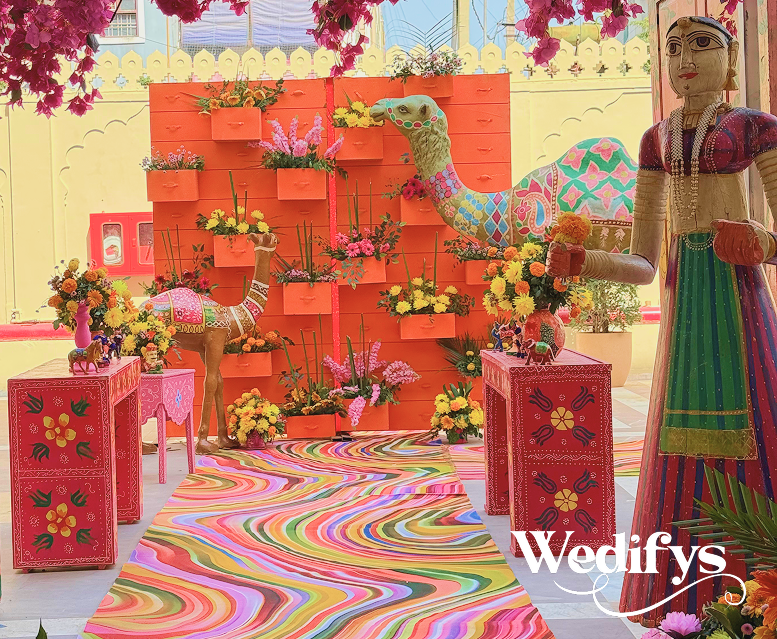 Haldi-Photo-Booth-Backdrop-with-Floral-Drawer-Wall-and-Rajasthani-Props-04242026