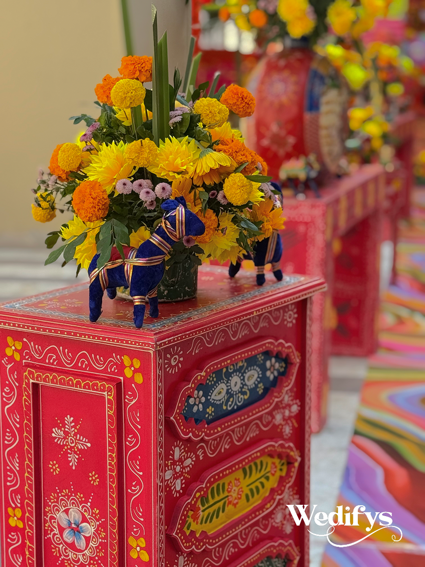 Haldi-Table-Arrangement-with-Floral-Decor-and-Vibrant-Wedding-Styling-04242026