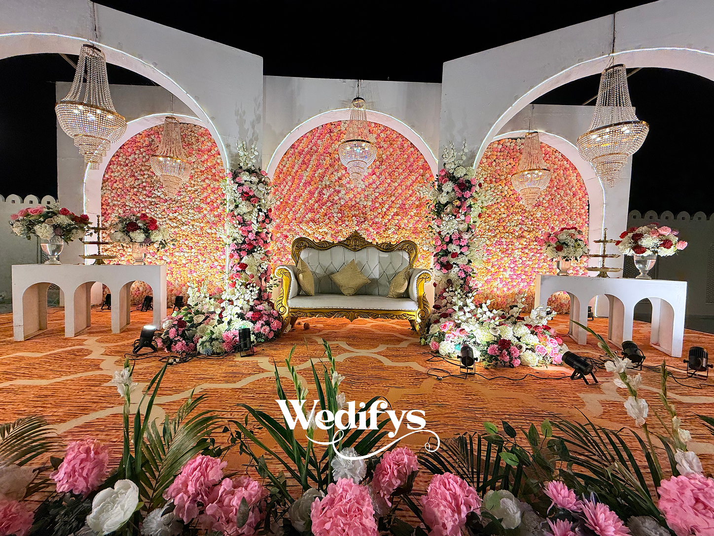 Layered-Floral-Stage-with-Arch-Depth-04252026