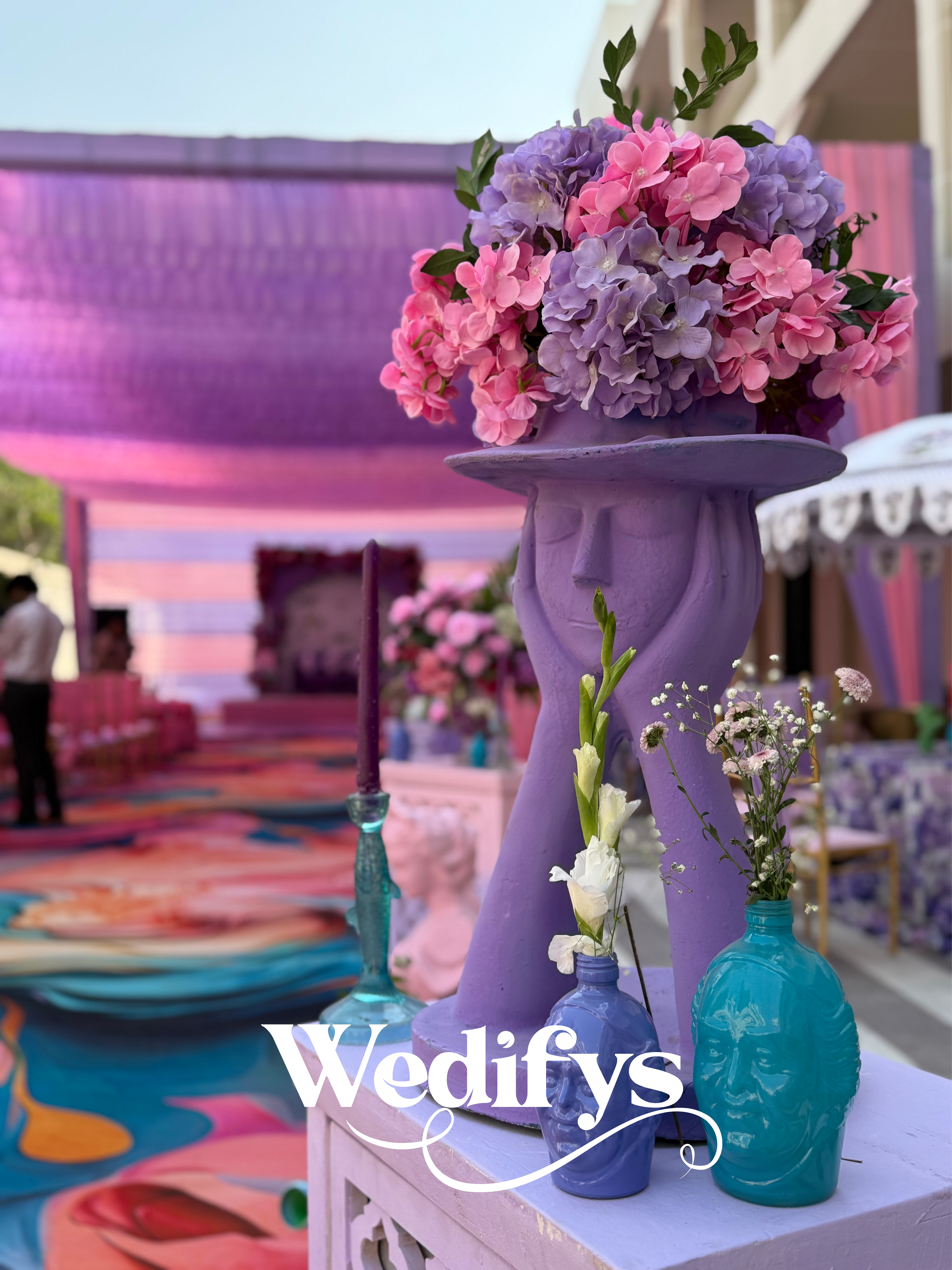 Lilac-Sculpture-Decor-with-Pastel-Floral-Arrangement-for-Haldi-04132026