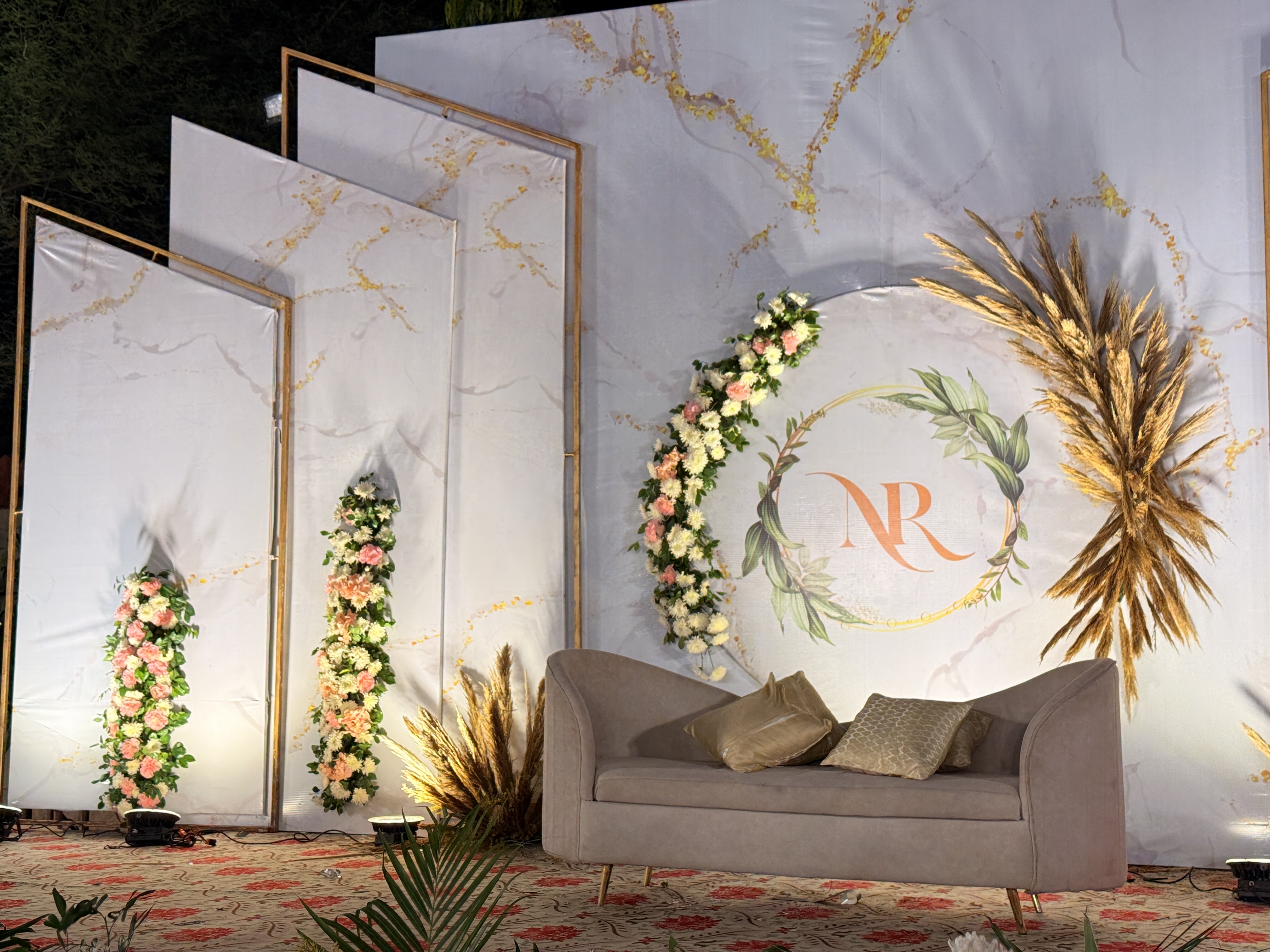 Luxury-Wedding-Stage-Side-Angle-With-Floral-Panels-And-Decor-Wedifys-Destination-Wedding-Planner-03272026