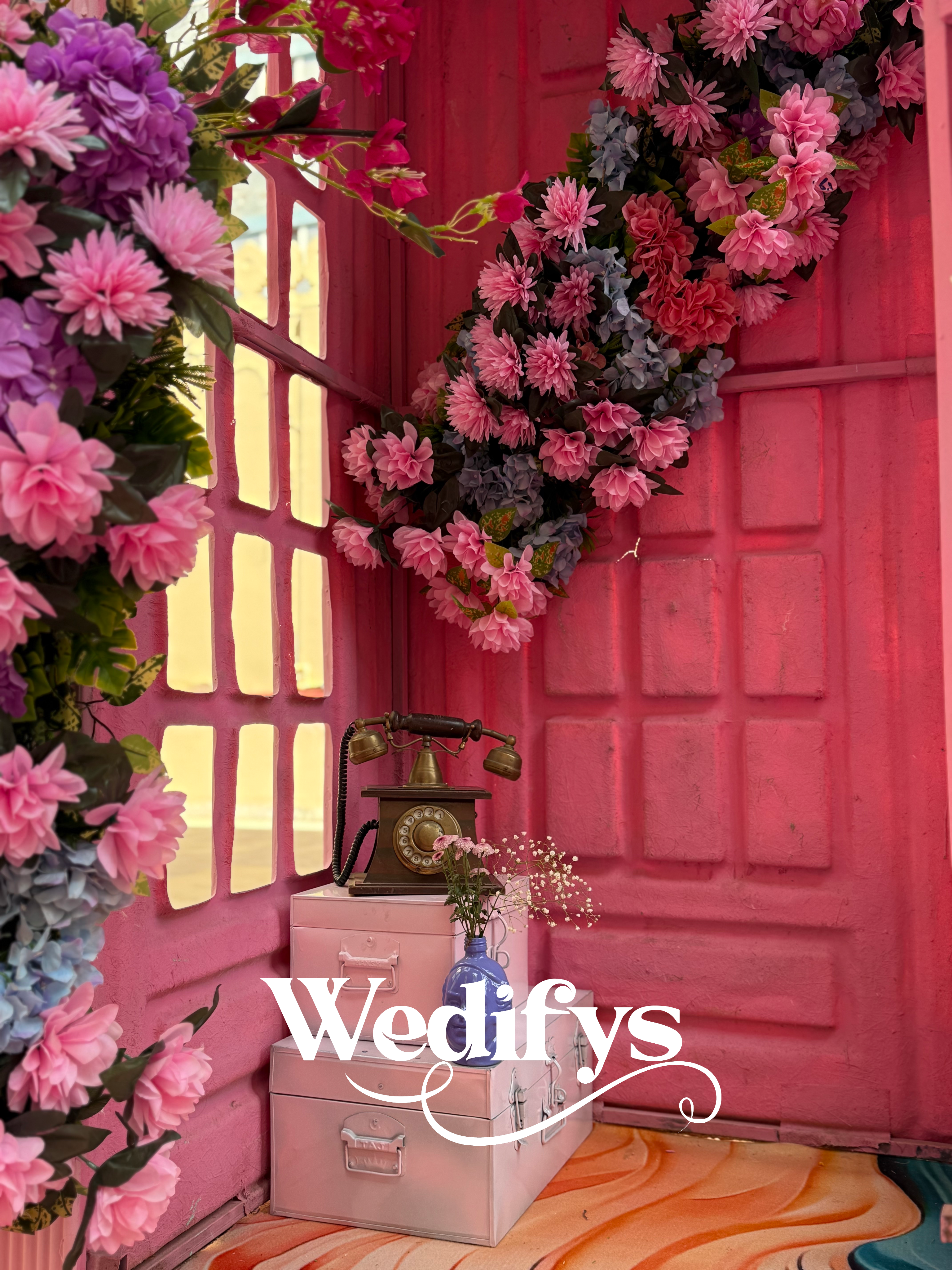 Pink-Haldi-Phone-Booth-Decor-with-Floral-Installation-04132026
