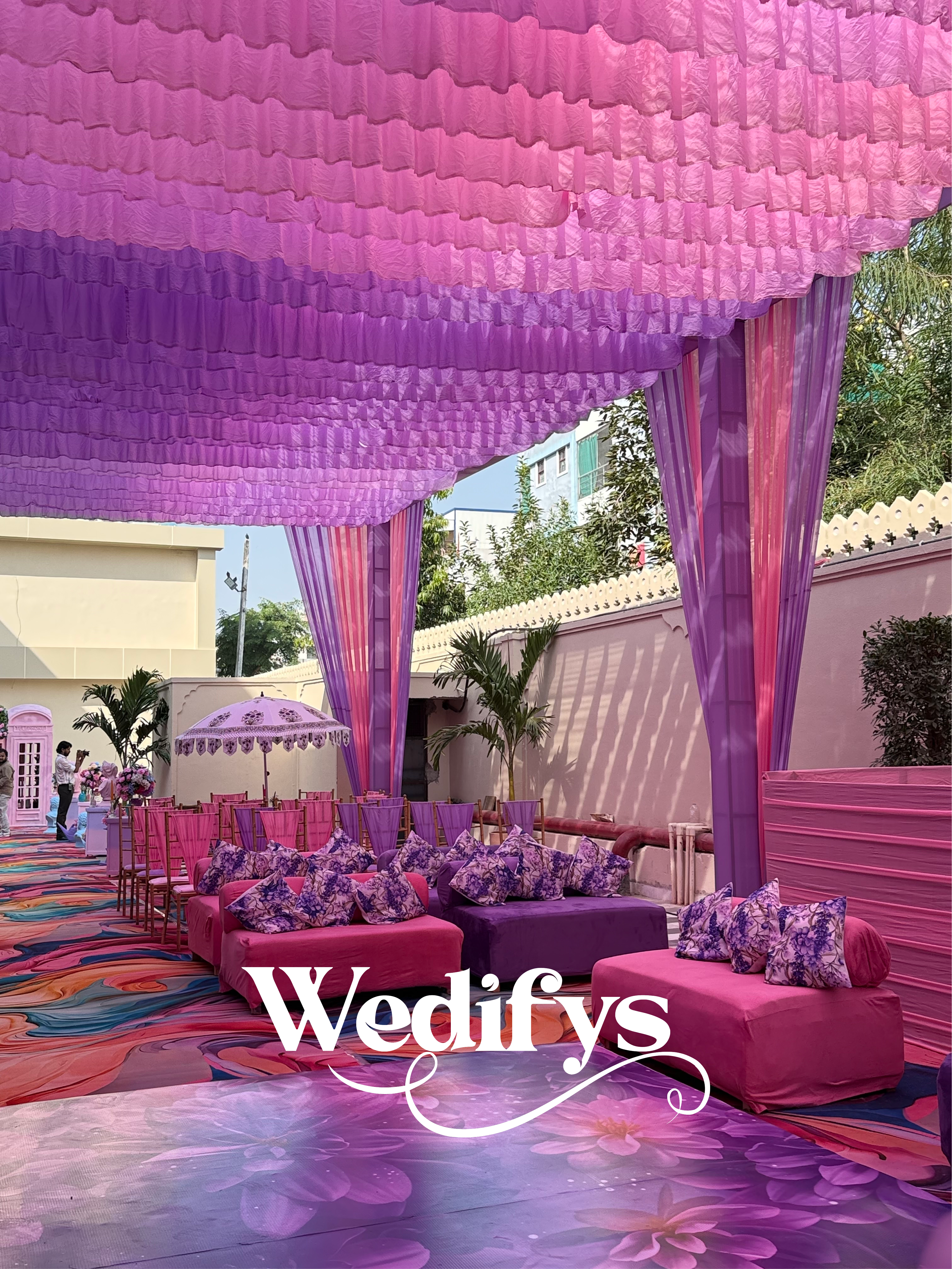 Pink-and-Purple-Haldi-Seating-Setup-with-Draped-Canopy-and-Lounge-Decor-04132026