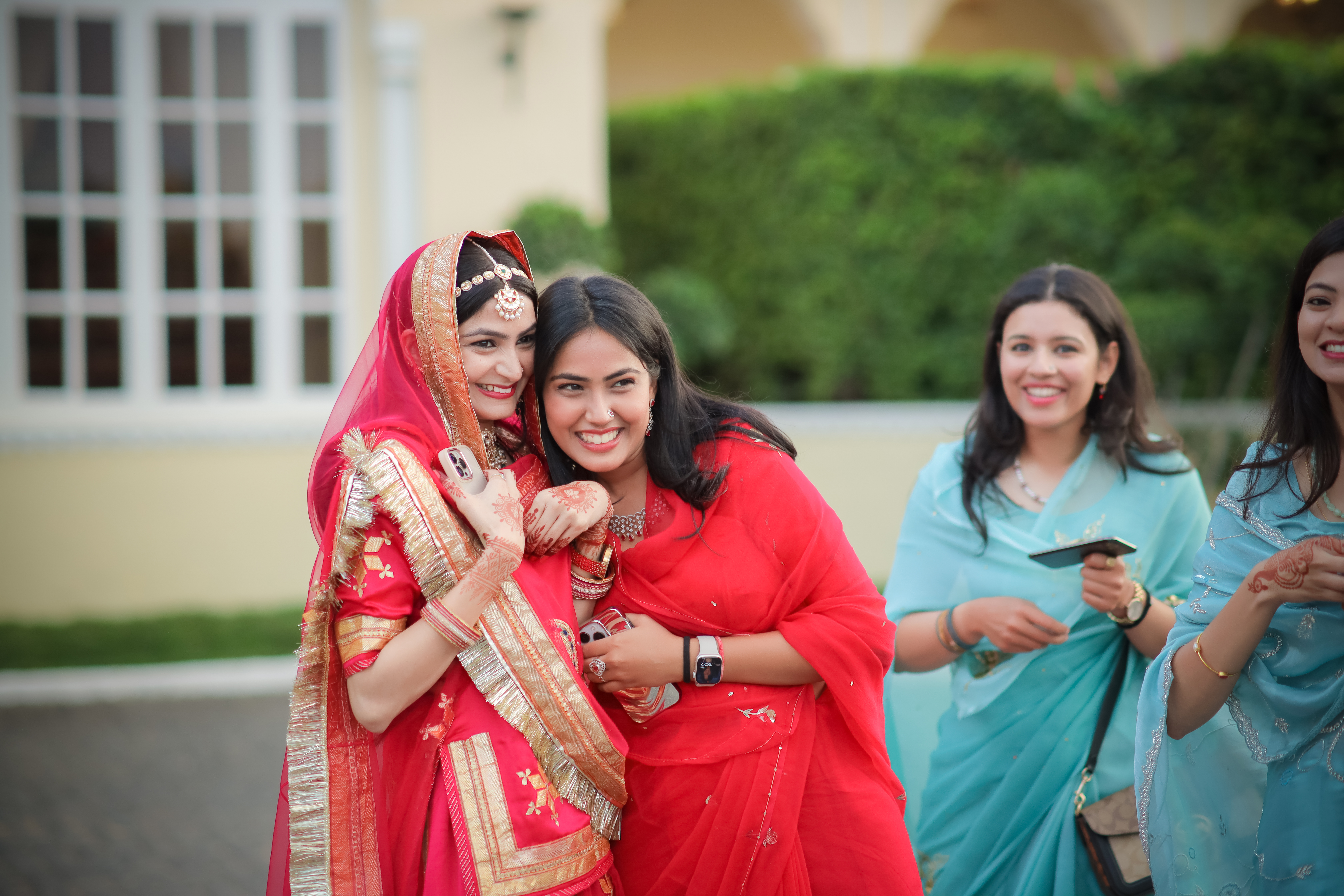 Radiant-Bride-Sharing-Joyful-Moment-With-Bridesmaid-11042025