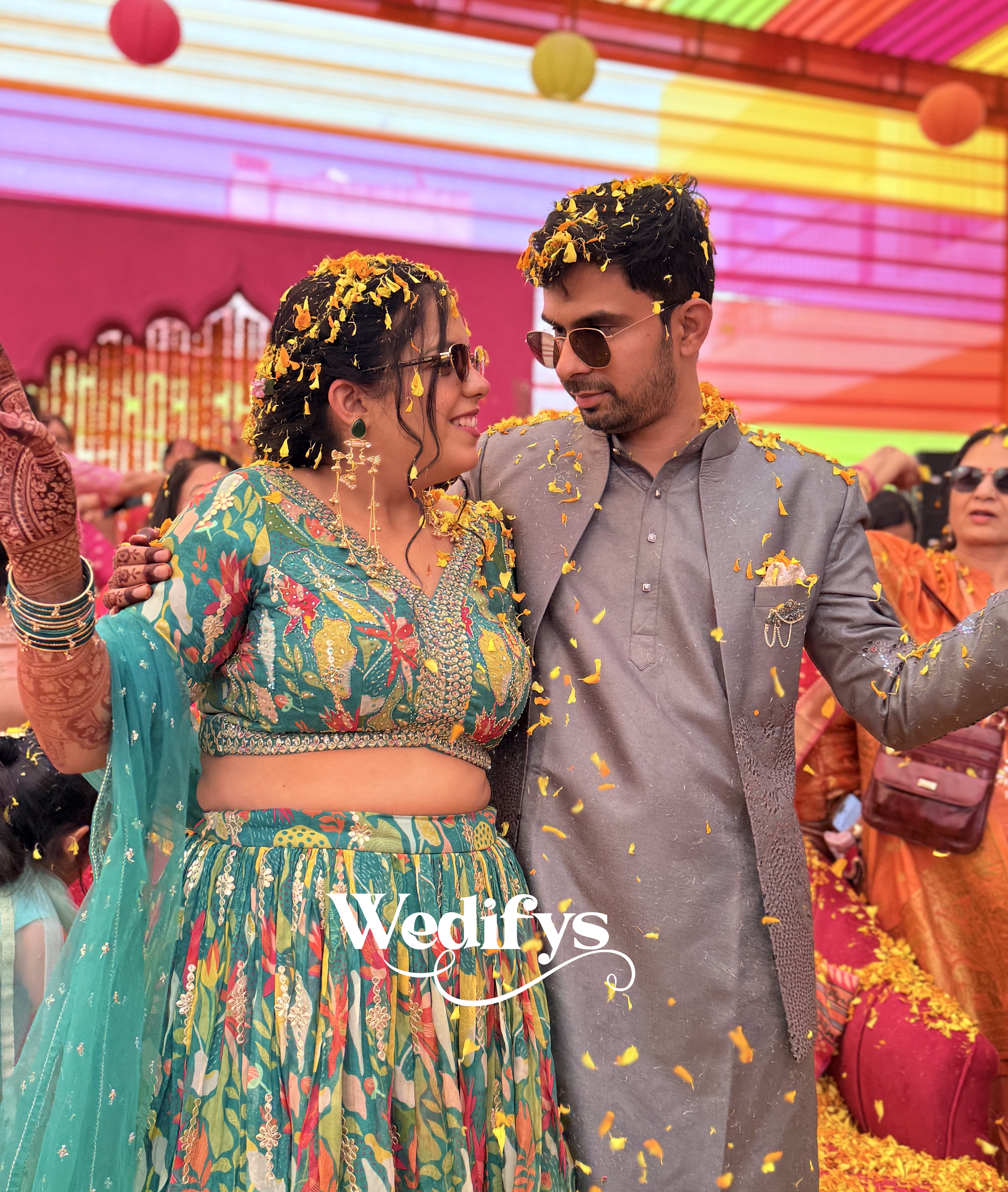 Romantic-Haldi-Couple-Pose-Floral-Shower-Wedding-Moment-04272026