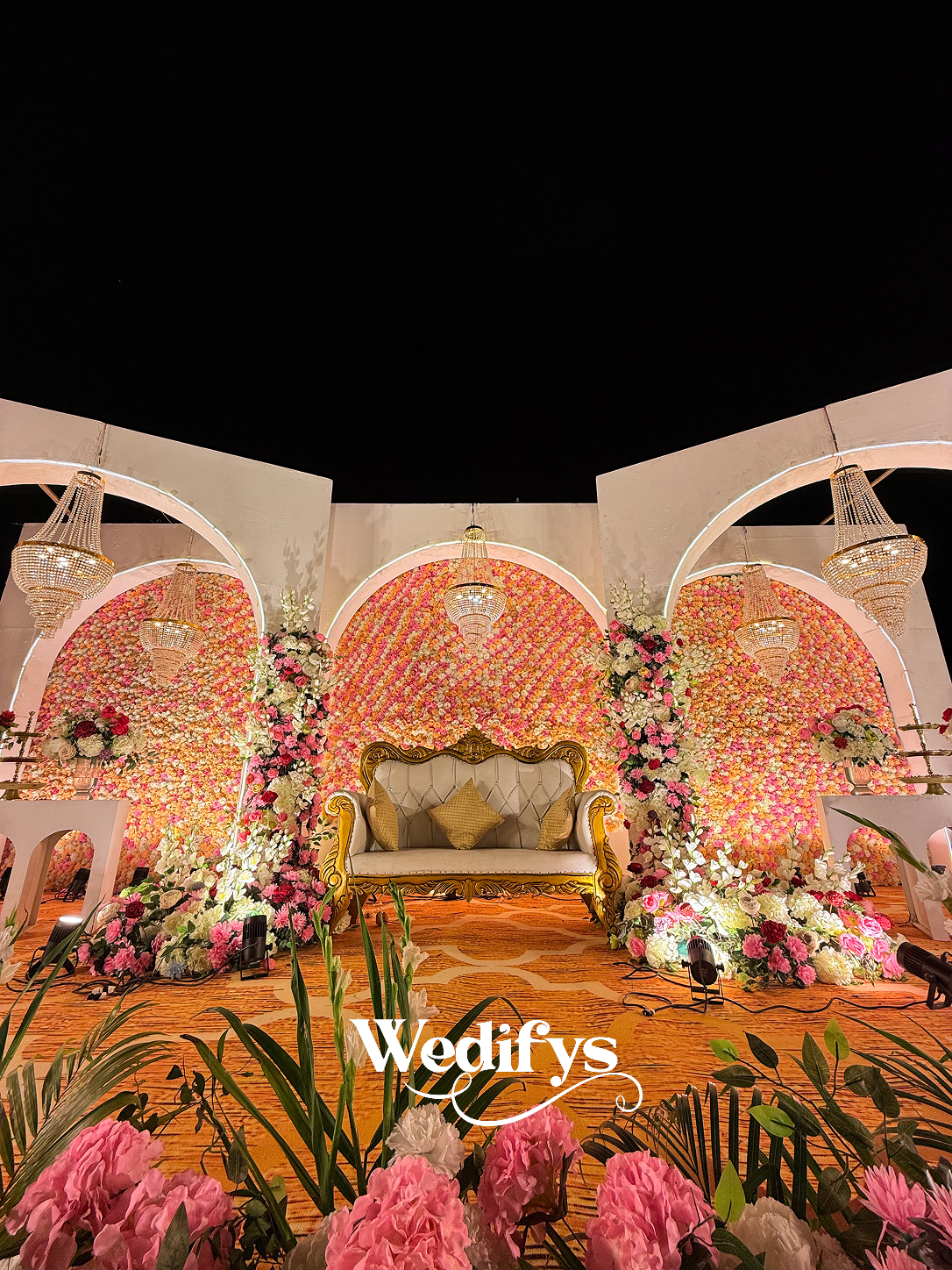 Royal-Couple-Seating-with-Floral-Backdrop-04252026