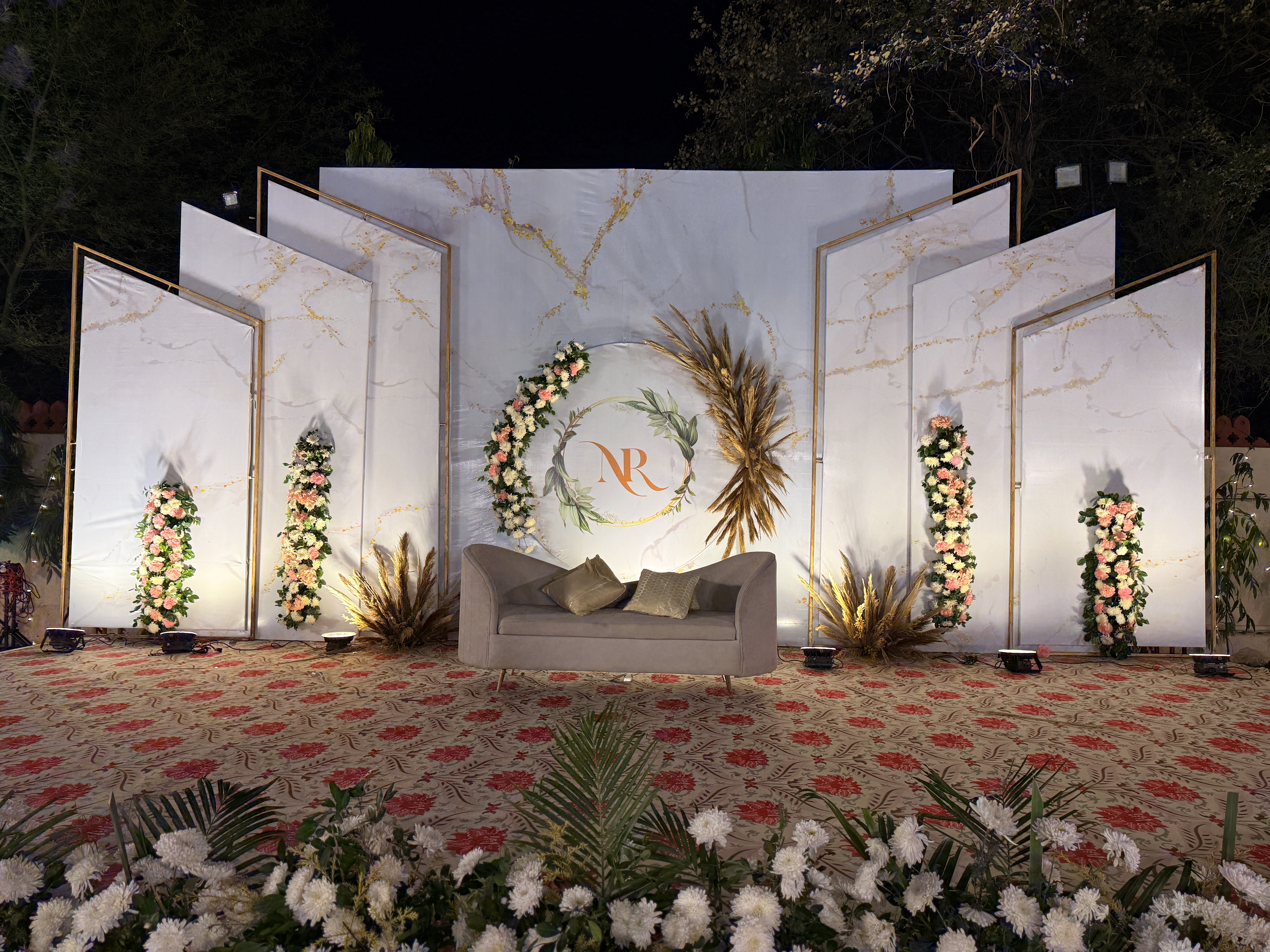 Wedding-Stage-Setup-With-Floral-Decor-And-Sofa-Seating-Wedifys-03272026
